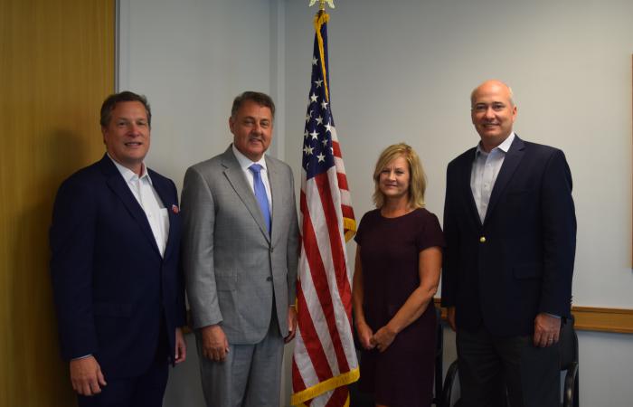 From left are Georgia Technology Authority Chief Information Office Calvin Rhodes, Sen. Steve Gooch, Broadband Executive Director Deana Perry, and DCA Commissioner Christopher Nunn.